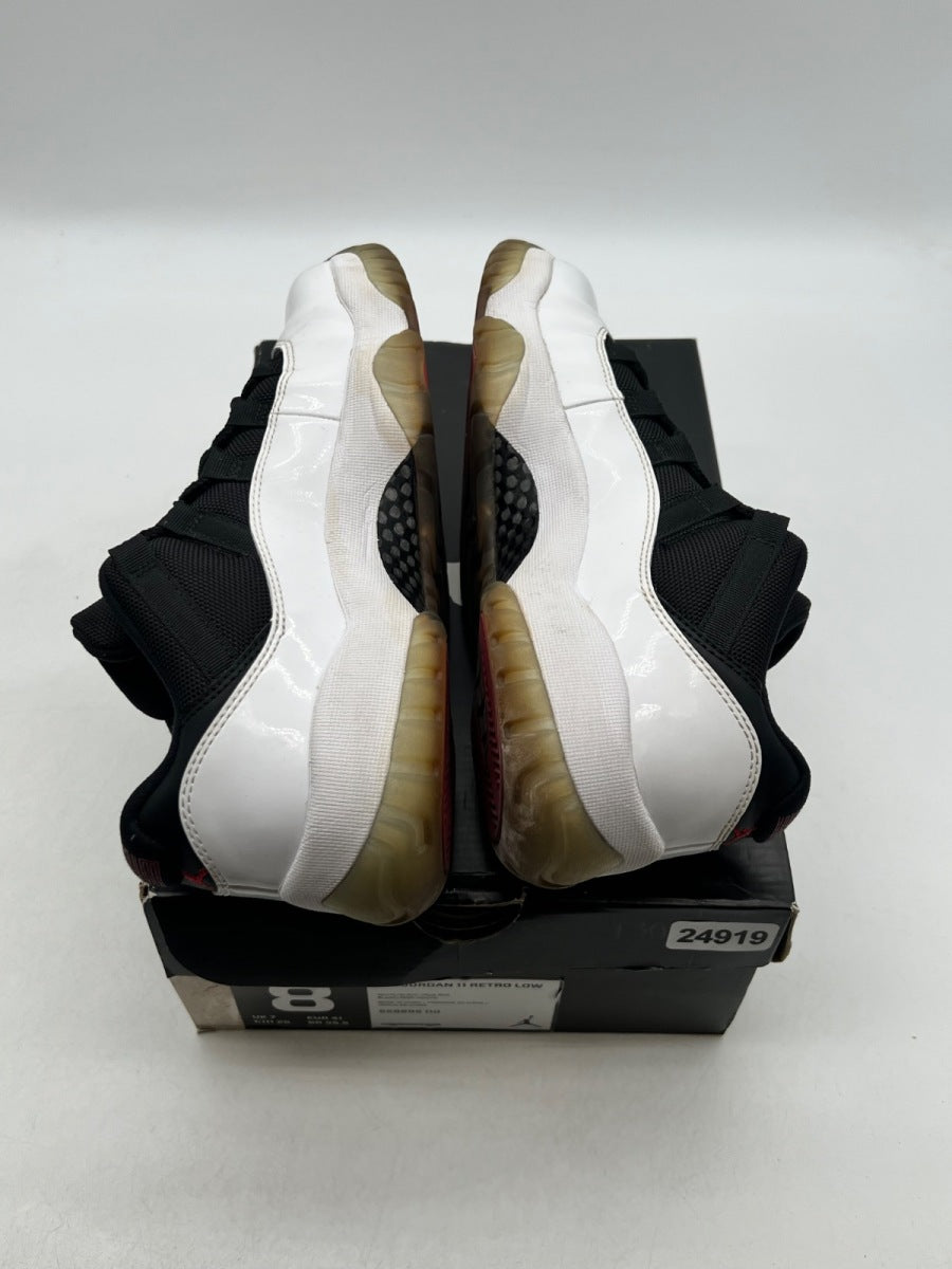 Jordan 11 Retro Low Tuxedo 8 (Moderately Worn Pre-Owned)JordanWhite/Black-True Red - Image 9