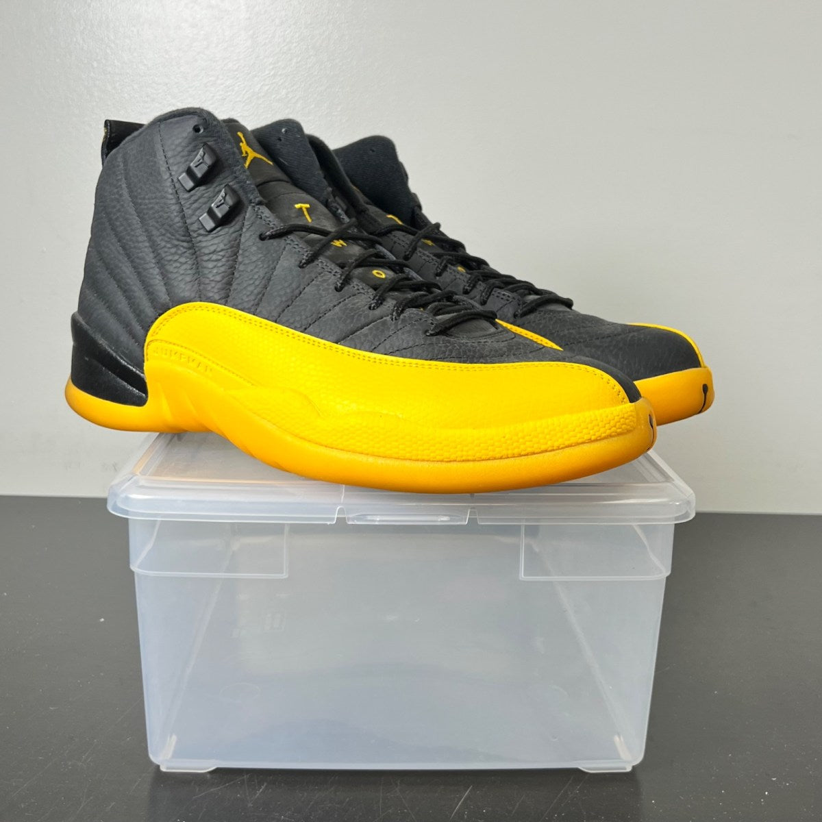 Jordan 12 Retro Black University Gold 10.5 (Lightly Worn Pre-Owned)JordanBlack/University Gold - Image 1