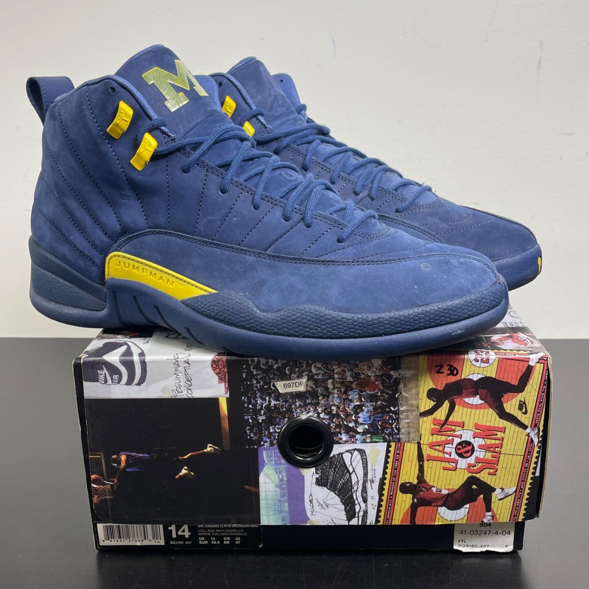 Jordan 12 Retro Michigan 14 (Moderately Worn Pre-Owned)JordanCollege Navy/Amarillo - Image 1