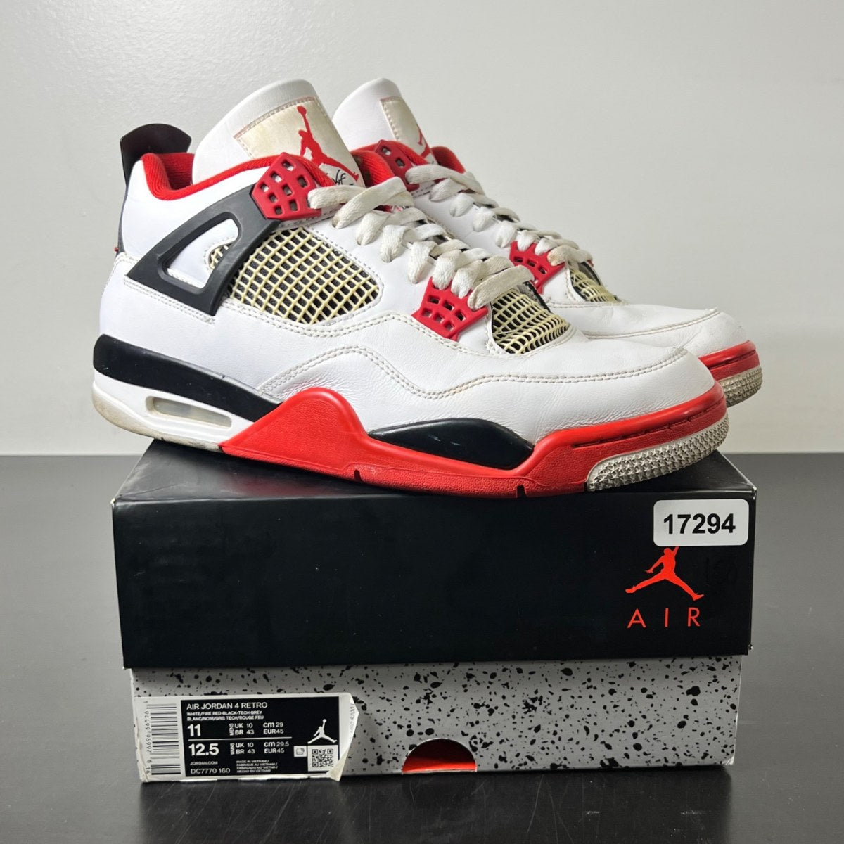 Jordan 4 Retro Fire Red (2020) 11 (Heavily Worn Pre-Owned)JordanWhite/Black-Tech Grey-Fire Red - Image 1