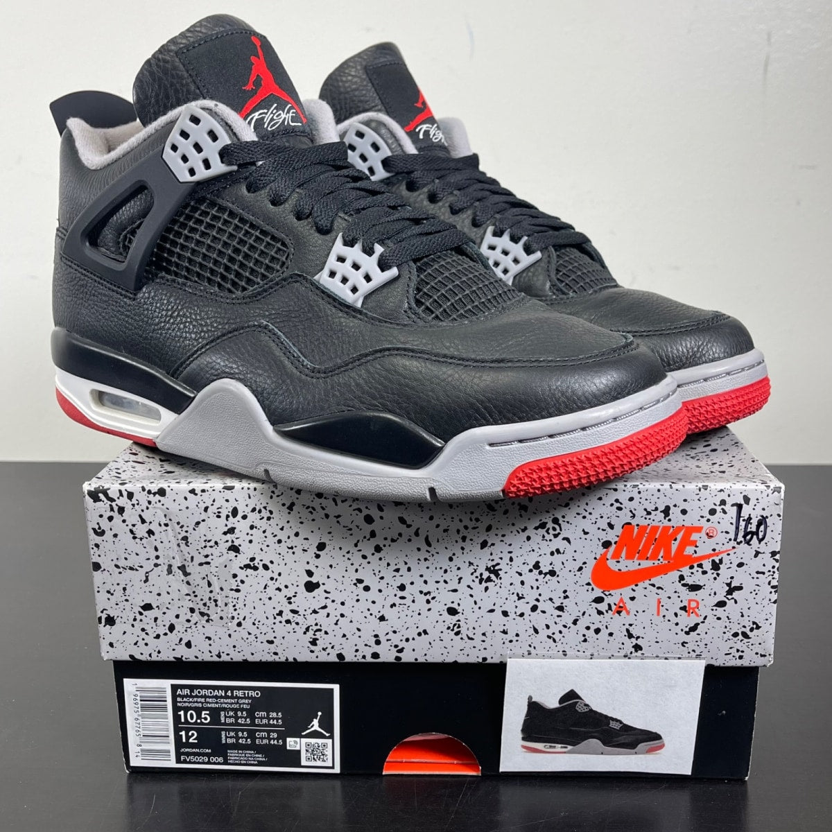 Jordan 4 Retro Bred Reimagined 10.5 (Moderately Worn Pre-Owned)JordanBlack/Cement Grey/Varsity Red/Summit White - Image 1