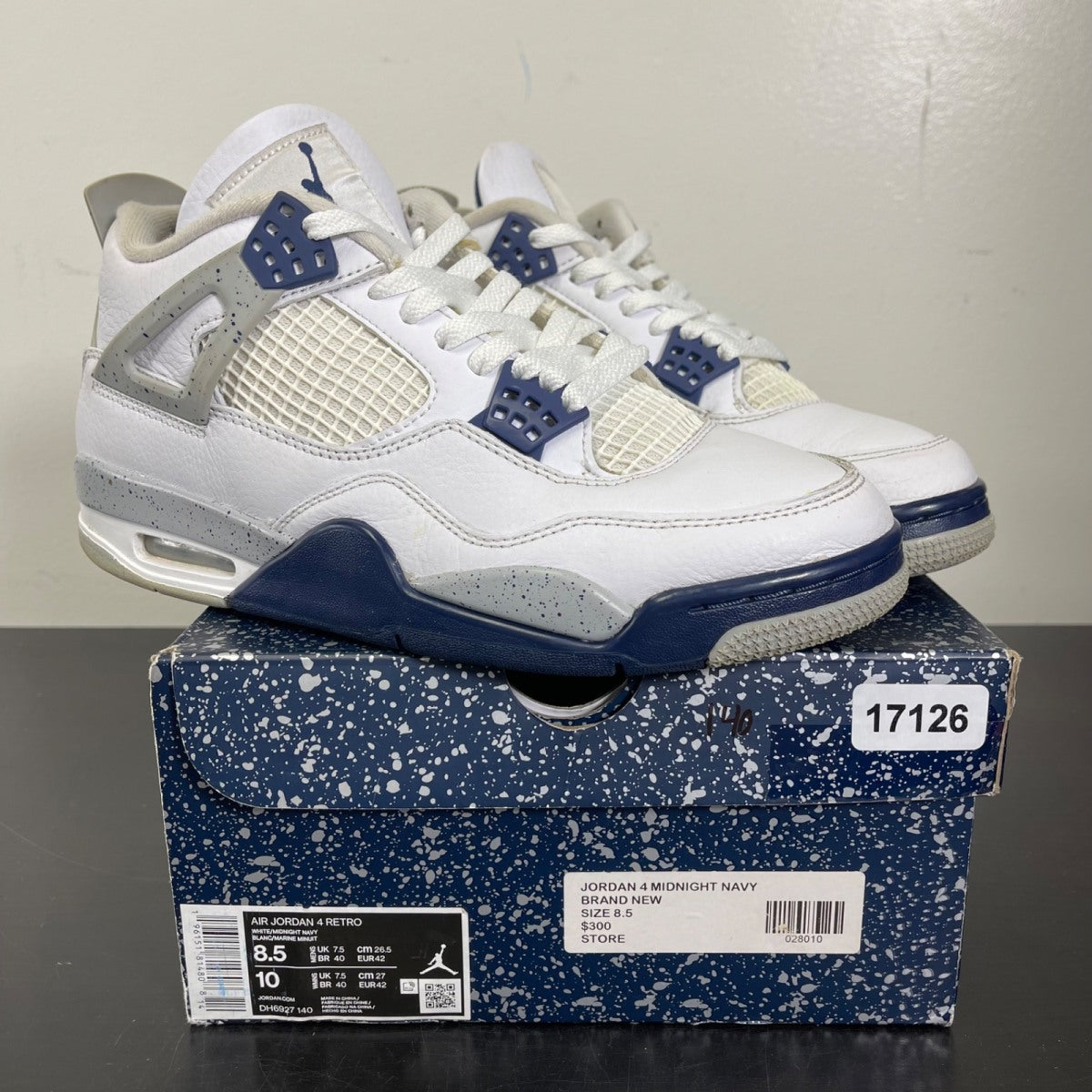 Jordan 4 Retro Midnight Navy 8.5 (Moderately Worn Pre-Owned)JordanWhite/Midnight Navy/Light Smoke Grey-Fire Red - Image 1
