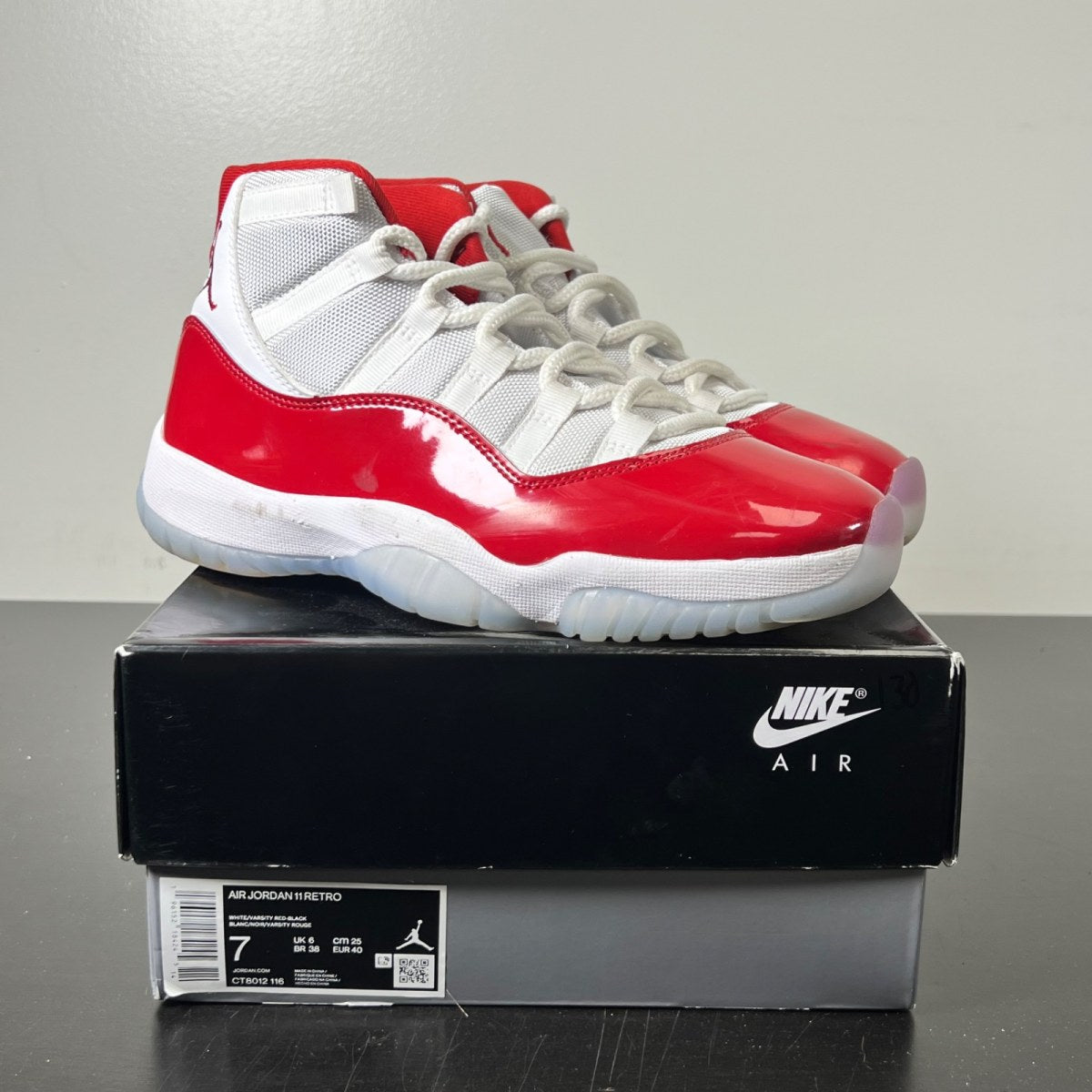 Jordan 11 Retro Cherry (2022) 7 (Lightly Worn Pre-Owned)JordanWhite/Varsity Red/Black - Image 1