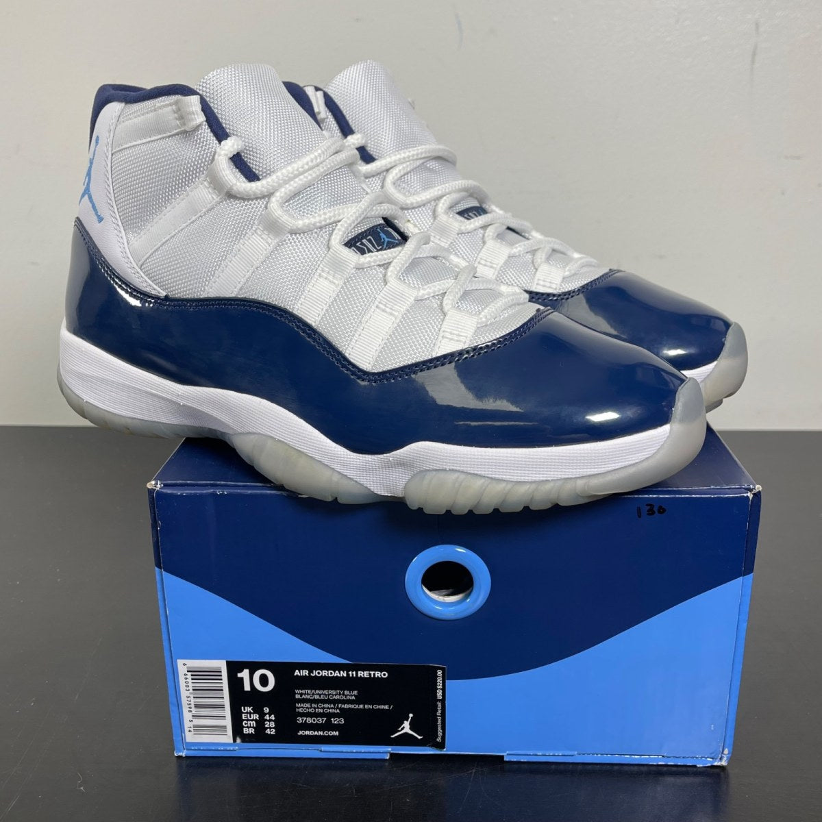 Jordan 11 Retro UNC Win Like 82 10 (Moderately Worn Pre-Owned)JordanWhite/University Blue-Midnight Navy - Image 1