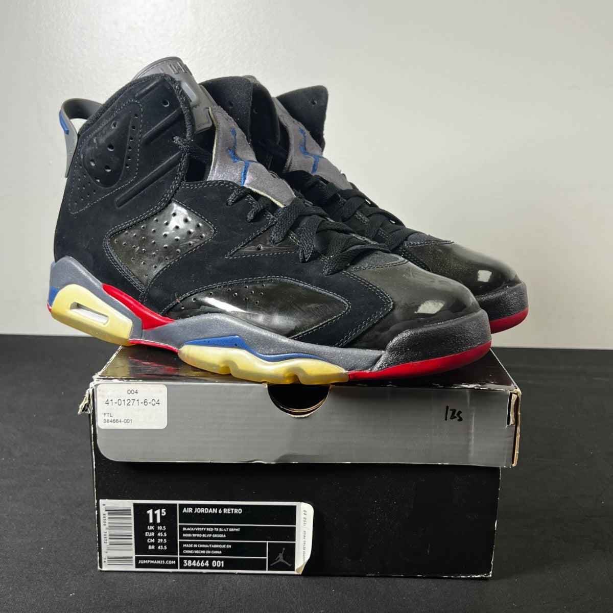 Jordan 6 Retro Pistons 11.5 (Heavily Worn Pre-Owned)JordanBlack/Varsity Red-True Blue-Light Graphite - Image 1