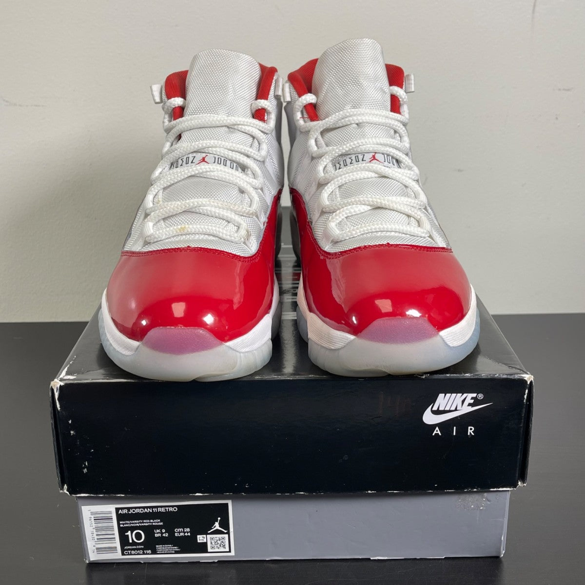 Jordan 11 Retro Cherry (2022) 10 (Moderately Worn Pre-Owned)JordanWhite/Varsity Red/Black - Image 2