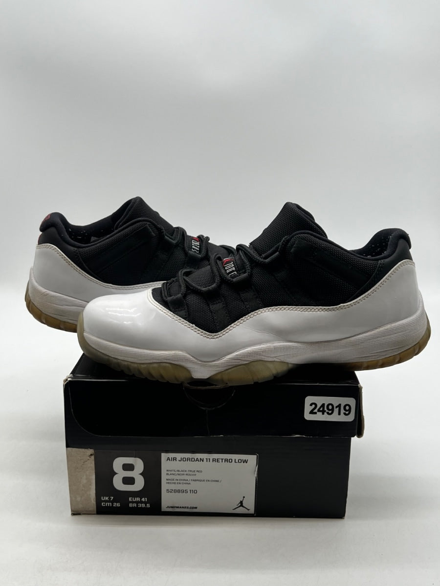 Jordan 11 Retro Low Tuxedo 8 (Moderately Worn Pre-Owned)JordanWhite/Black-True Red - Image 1