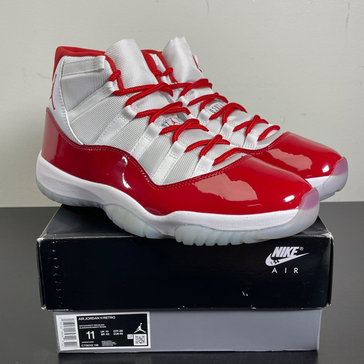 Jordan 11 Retro Cherry (2022) 11 (Moderately Worn Pre-Owned)JordanWhite/Varsity Red/Black - Image 1