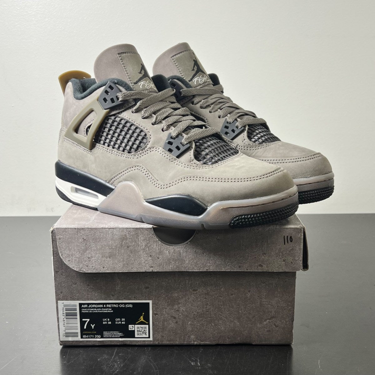 Jordan 4 Retro Cave Stone (GS) 7Y (Lightly Worn Pre-Owned)JordanCave Stone/Black/Moon Particle - Image 1