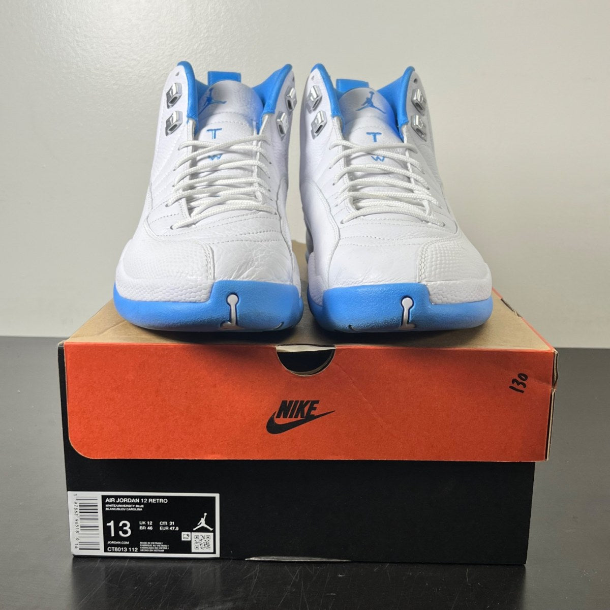 Jordan 12 Retro Melo (2025) 13 (Lightly Worn Pre-Owned)JordanWhite/University Blue/Metallic Silver - Image 2